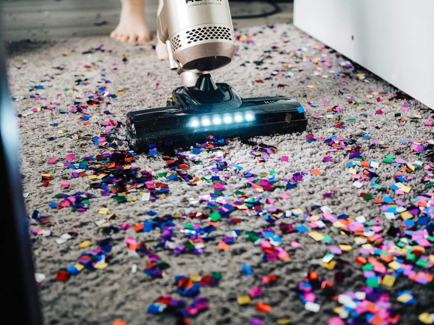 Vacuuming a carpet during a Toronto move-out clean
